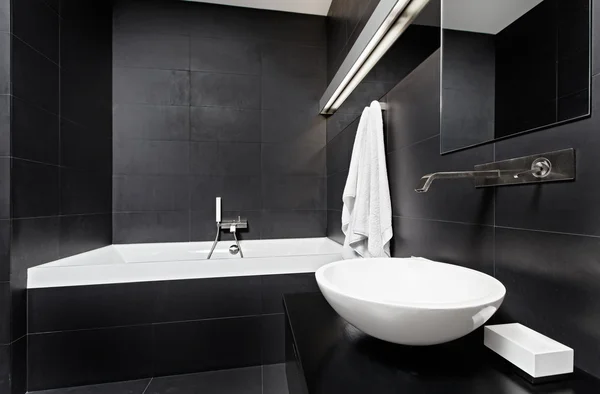 Modern minimalism style bathroom interior in black and white tones