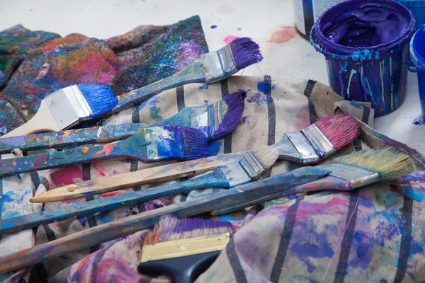 Paintbrushes in a painters studio