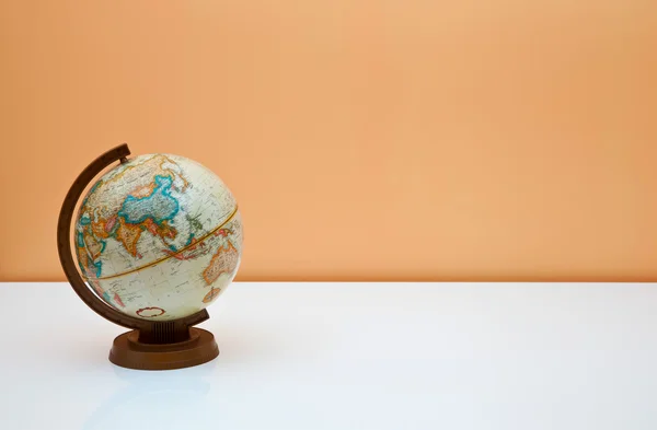 The globe on the students desk — Stock Photo #11500658