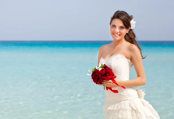 Young bride and blue sea