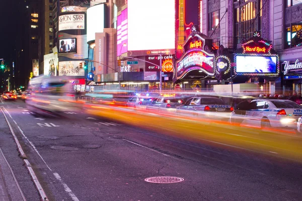 NEW YORK - MARCH 7: Yellow cabs speed through Times Square landm