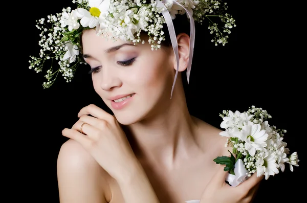 Portrait of the beautiful girl with flowers in hair — Stock Photo #11502074