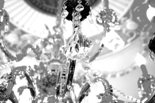 Beautiful crystal chandelier in a room. Close up on the crystal