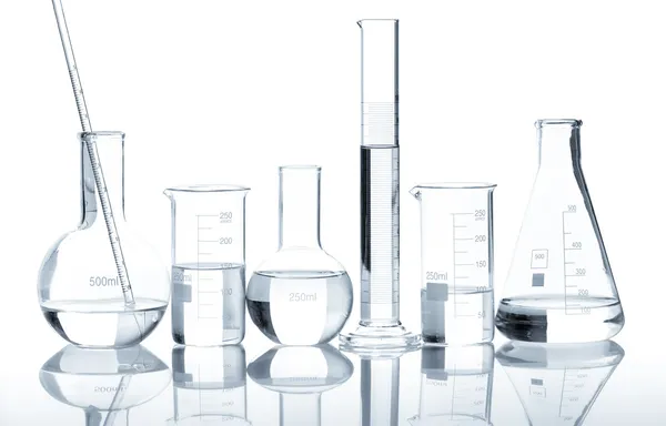 Group of laboratory flasks with a clear liquid
