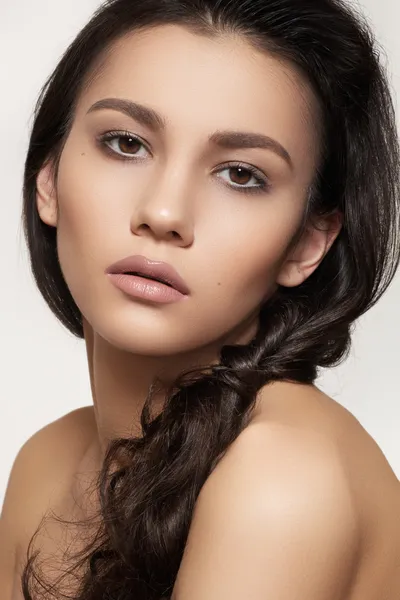 Portrait of sexy caucasian young woman. Natural spa beauty with pure skin. Beautiful model with natural make-up, clean skin and romantic hairstyle