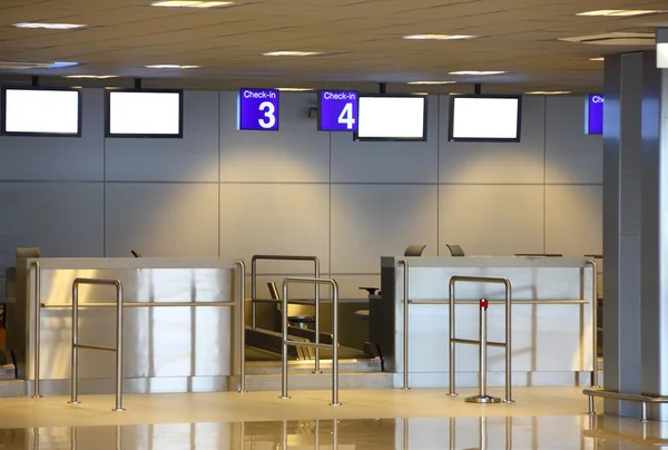Modern interior of airport terminal check-in