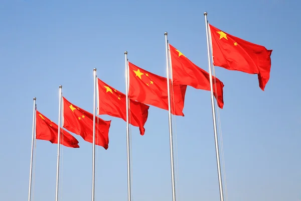 A row of Chinese flags