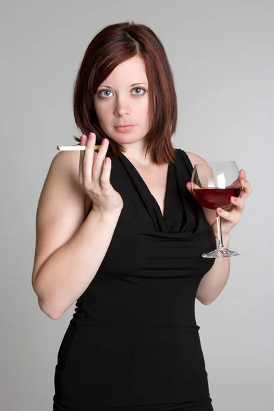Woman Smoking and Drinking Wine