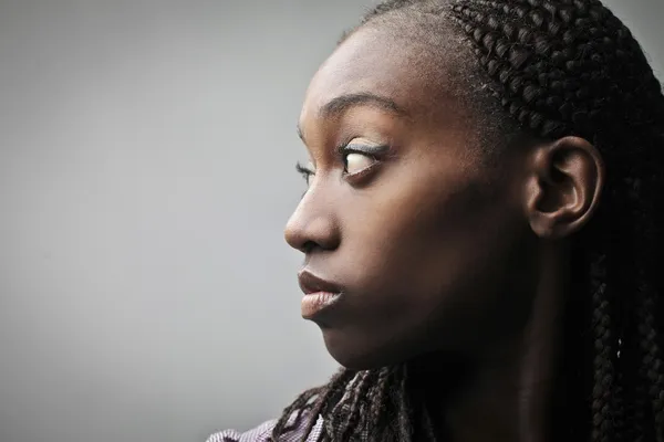 Profile of a young african woman