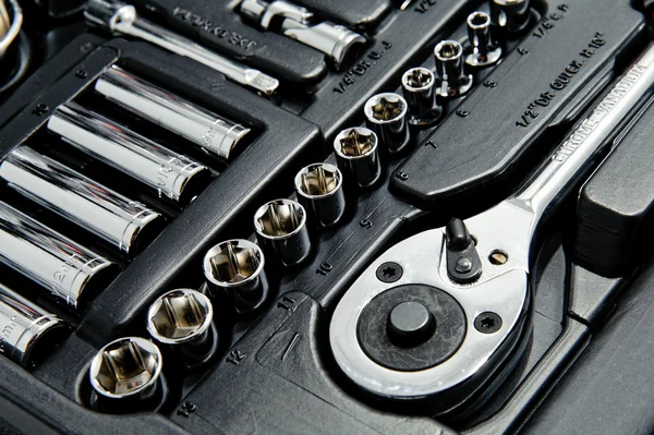 Close up shot of kit of metallic tools