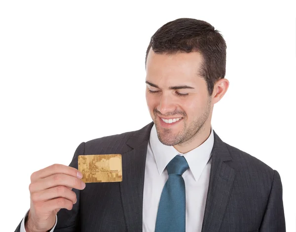 Successful businessman holding credit card — Stock Photo #12393894