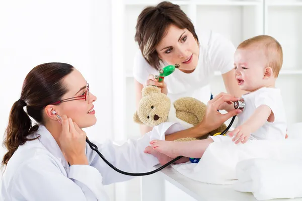 Mother and baby in pediatrician office