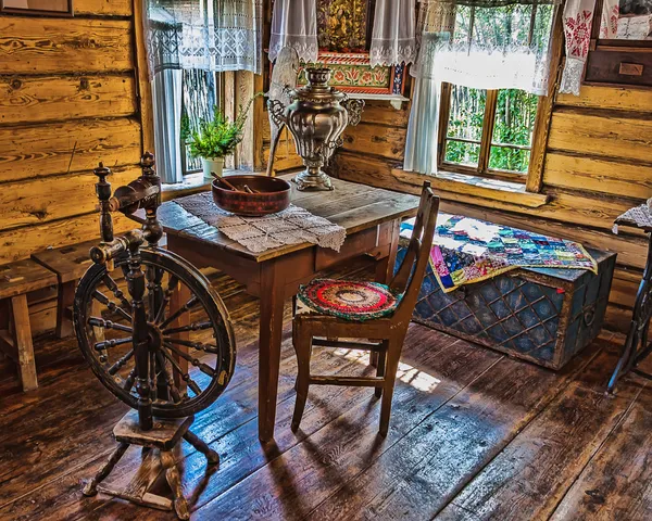 Interior of Russian log hut with elements of the old way of li