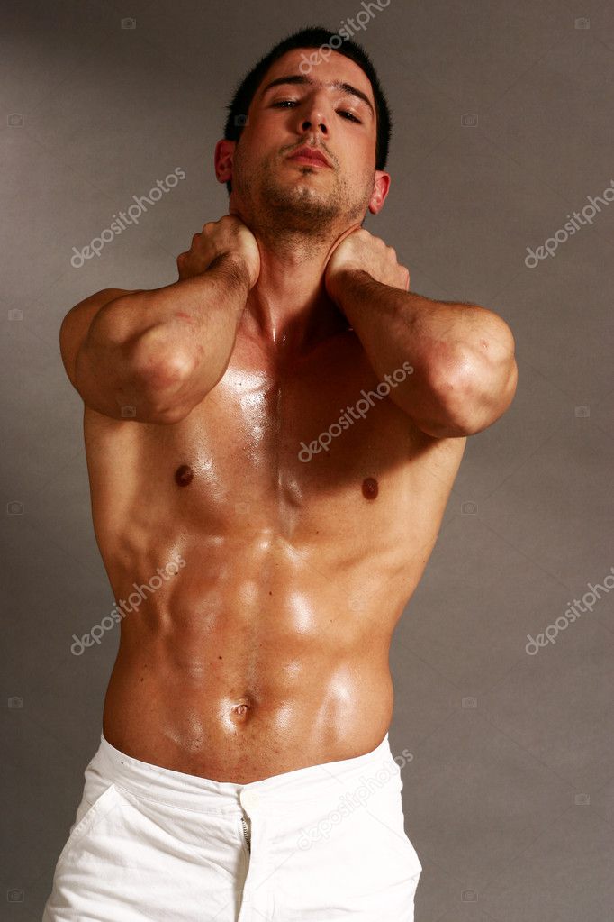 depositphotos_11923570-Muscular-macho-man-showing-his-perfect-oiled-body.jpg
