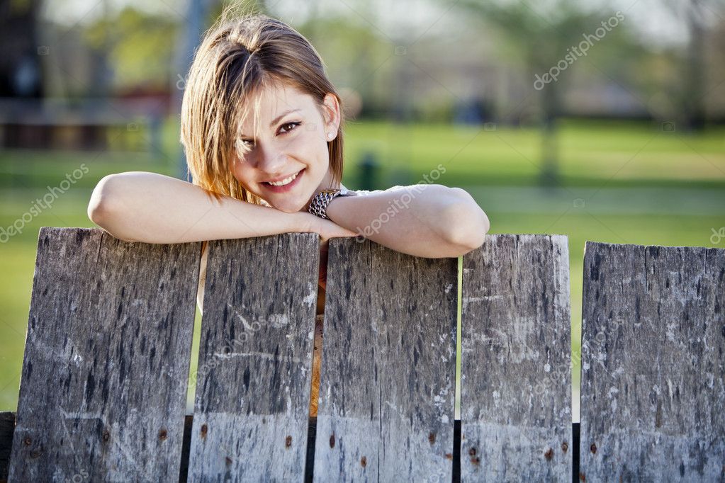 depositphotos_10749014-Girl-by-the-fence.jpg