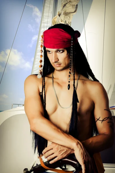 Male pirate on a sail boat