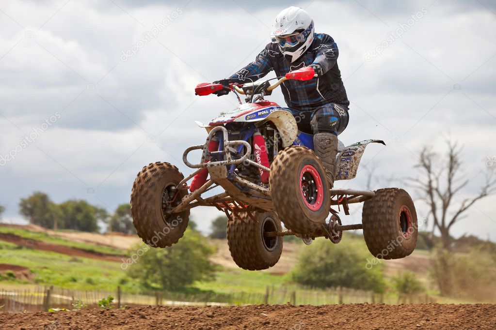 Quad bike jumping Stock Editorial Photo © i4lcocl2 10887762