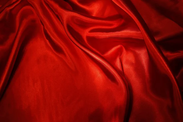 Closeup of rippled red silk fabric