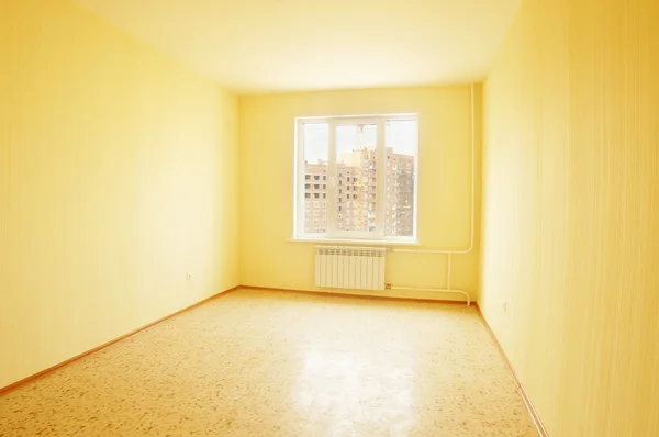 Empty yellow room in new house