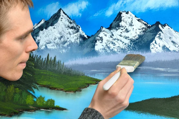 Artist creating a landscape painting