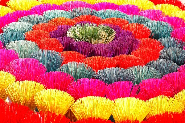 Colorful incense or joss sticks for buddhist prayers