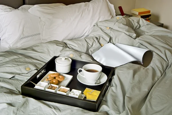 Breakfast tray on the bed in the bedroom