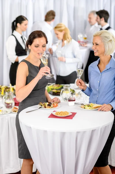 Business women drink aperitif company meeting