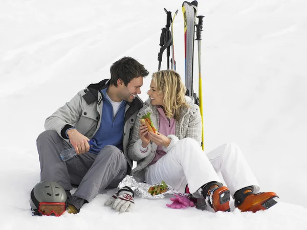 Young Couple With Picnic On Ski Vacation — Stock Photo #11882635