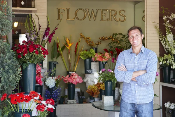 Man standing outside florist
