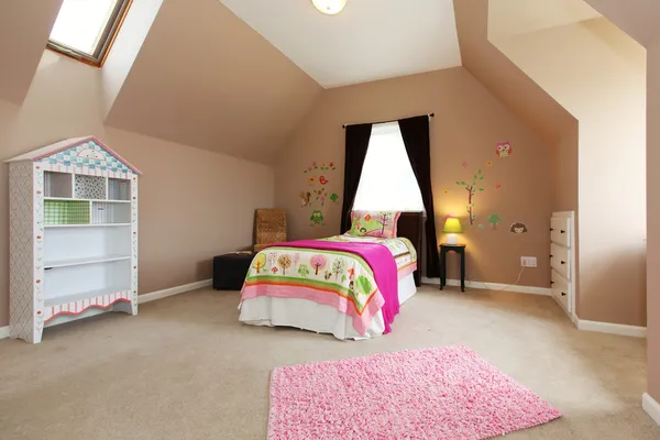 Baby girl kids bedroom with pink bed and brown walls.