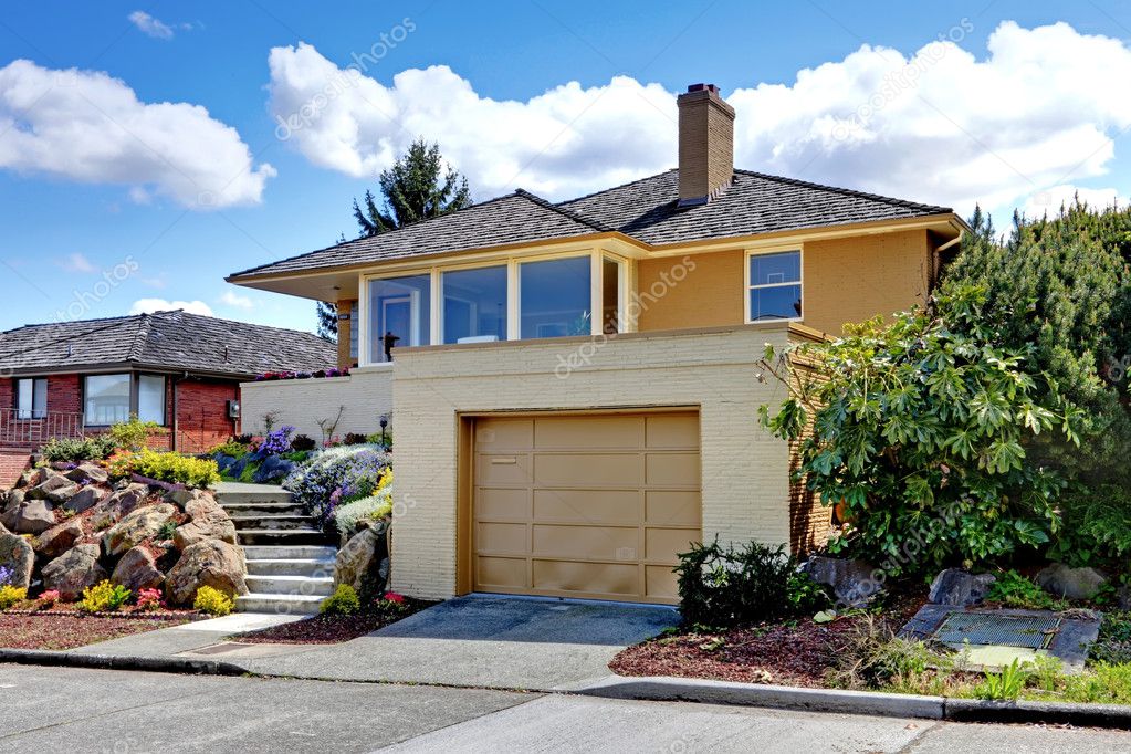 modern caramel color house with garage stock photo modern caramel color house with garage stock photo