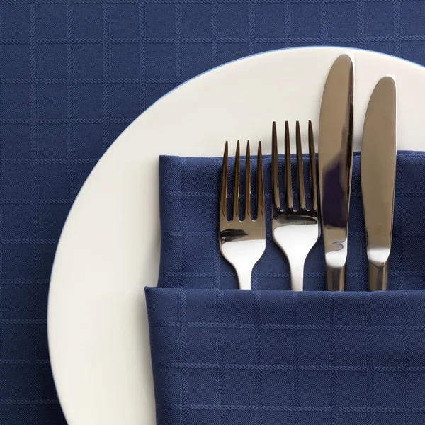 Place Setting with Blue Napkin