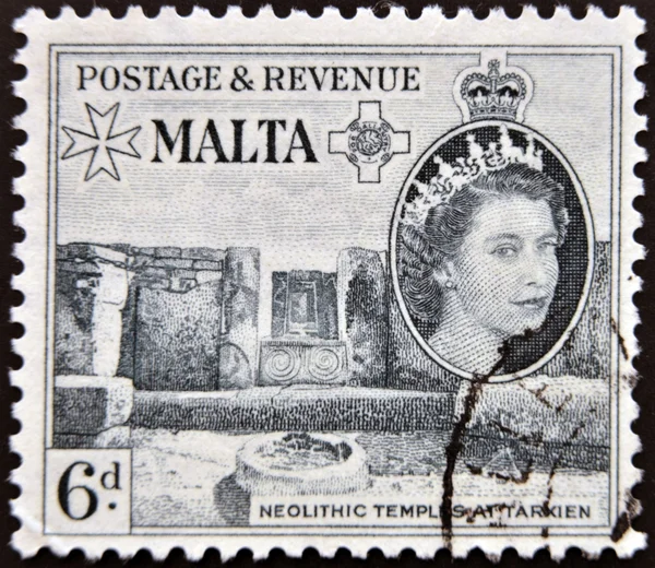 MALTA - CIRCA 1956: A stamp printed in Malta shows Neolithic temple of Ggantija in Gozo, Malta, circa 1956