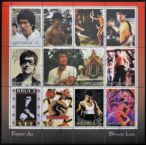 REPUBLIC OF SAKHA (YAKUTIA) - CIRCA 2000: A stamp printed in Yakutia shows Bruce Lee in 12 stamp views of a great star of Martial Arts scenes from many of his most famous movies, circa 2000