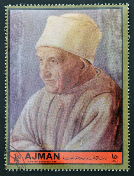 AJMAN - CIRCA 1972: A stamp printed in Ajman Christmas collection, peace in the world, shows portrait of an old man painted by Lippi, circa 1972