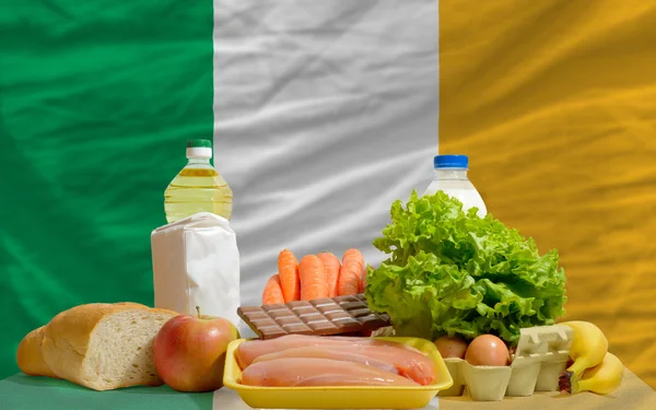 Basic food groceries in front of ireland national flag