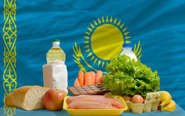 Basic food groceries in front of kazakhstan national flag