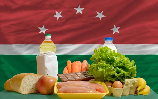 Basic food groceries in front of maghreb national flag