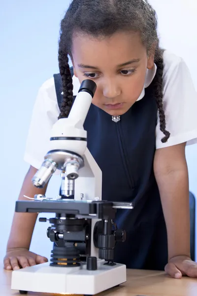 African American School Girl Child Using Microscope