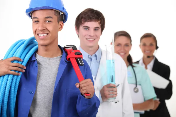 Four different professions with focus on plumber