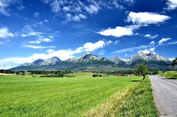 View of mountain peaks in summer time in High Tatras
