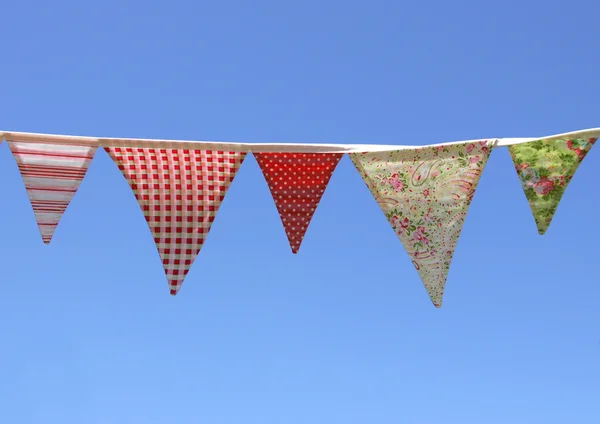Country Bunting on blue sky