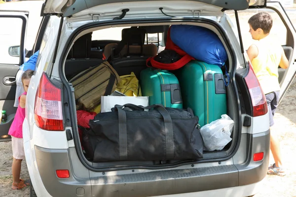 Family car of charge luggage ready for departure