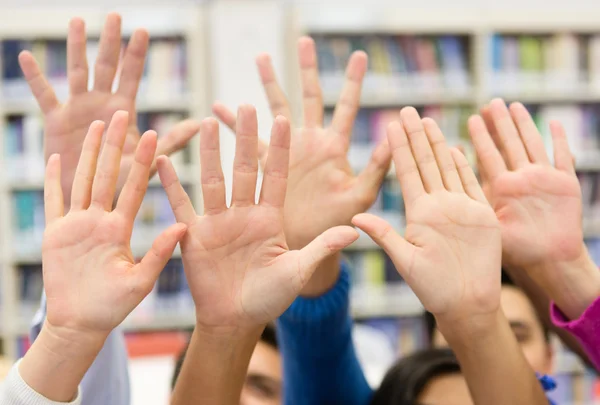 Students raising their hand