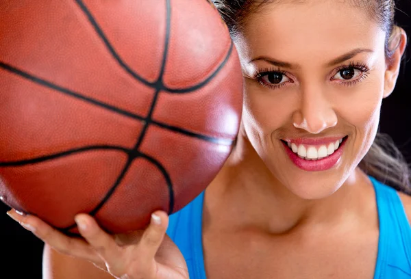 Woman holding basketball
