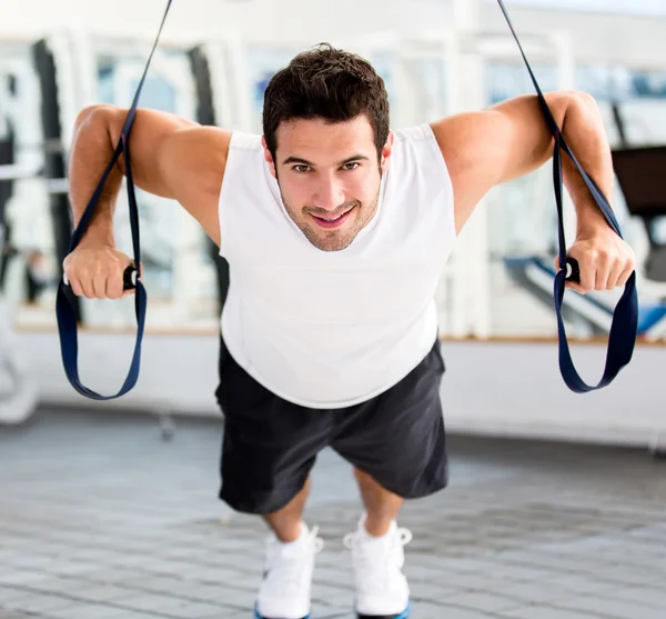 Man exercising at the gym