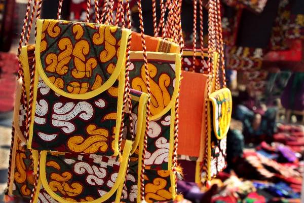 Handmade purse with traditional ornament.