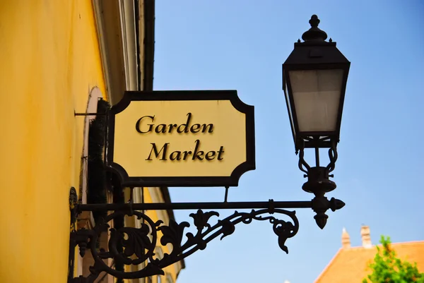 Lamp and Garden Market street plate in Budapest old town
