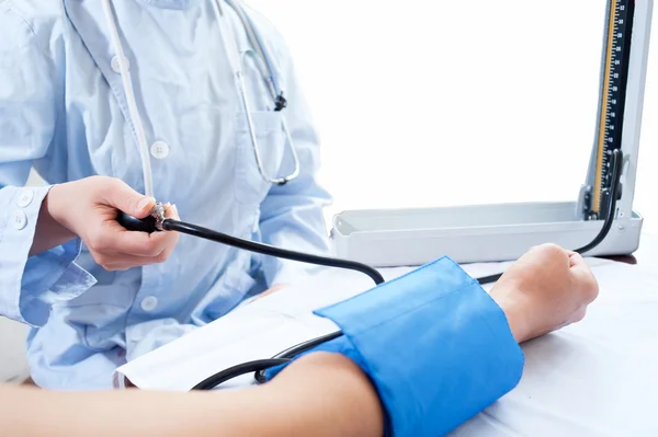 Female nurses in blood pressure