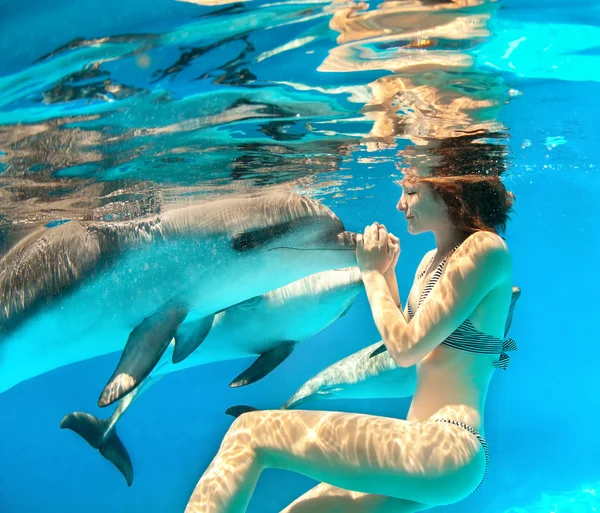 Girl and dolphin